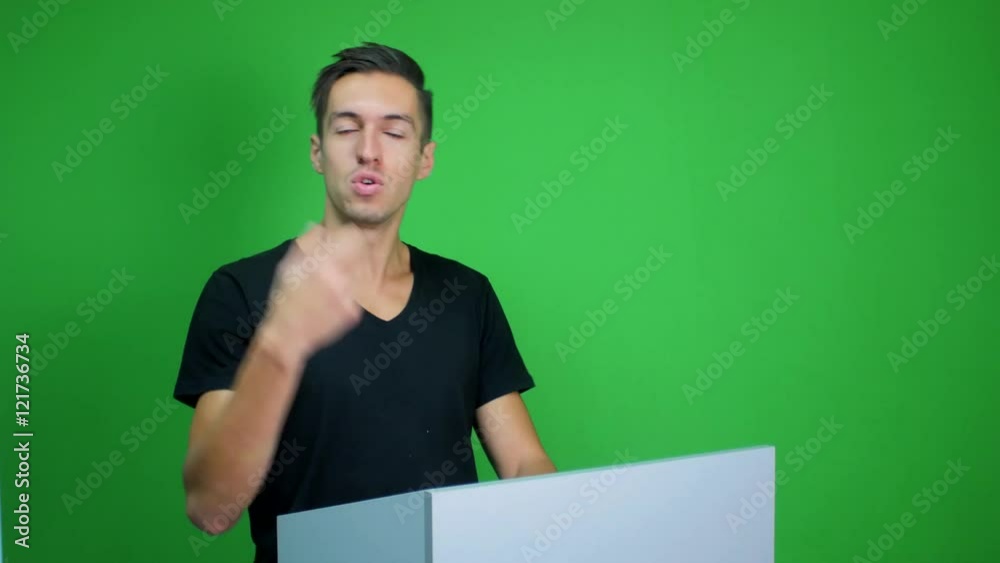 man making a presentation at green screen background
