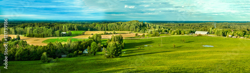 Countryside panorama of green field