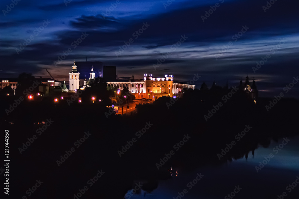 Tyumen, Russia - July 10, 2005: Night view onto Nikolsky Vzvoz, Krestovozdvizhensky temple, State architectural and construction university, Holy Trinity Monastery