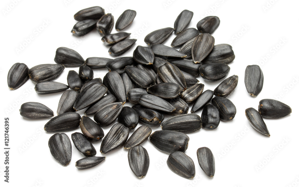 Sunflower seeds isolated on white background close up Sunflower seeds isolated on white background close up