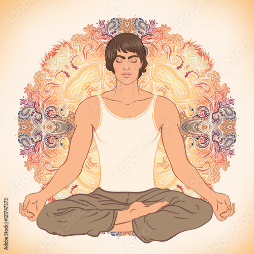 Beautiful Caucasian Man sitting in Lotus pose with ornate mandal