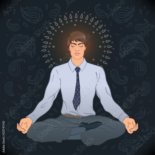 Beautiful Caucasian Man sitting in Lotus pose with ornate mandal