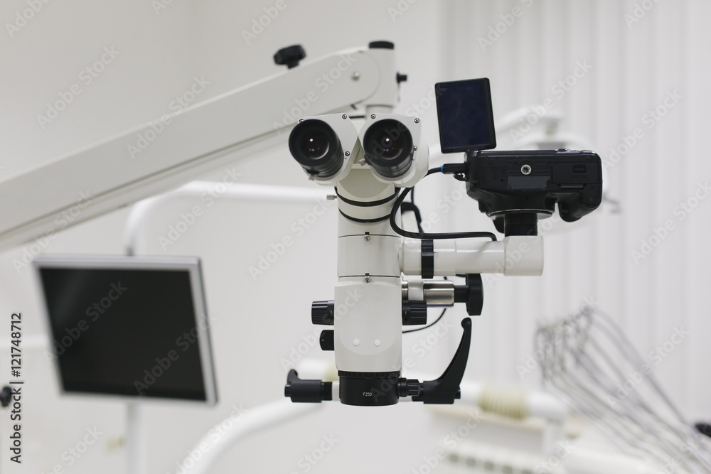 Professional modern microscope equipment at dental office