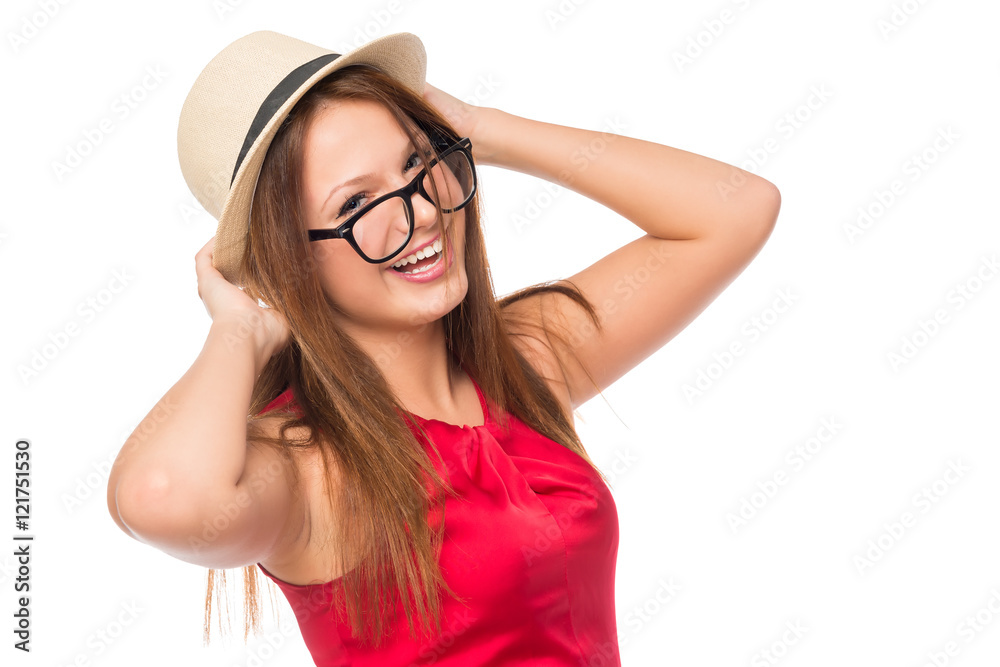 cheerful girl in a hat and glasses isolated in the studio cheerful girl in a hat and glasses isolated in the studio