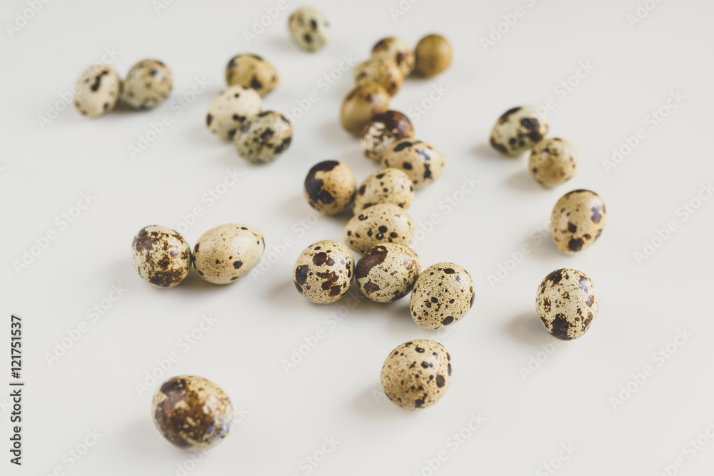 Pile of raw quail eggs isolated on white background
Pile of raw quail eggs isolated on white background