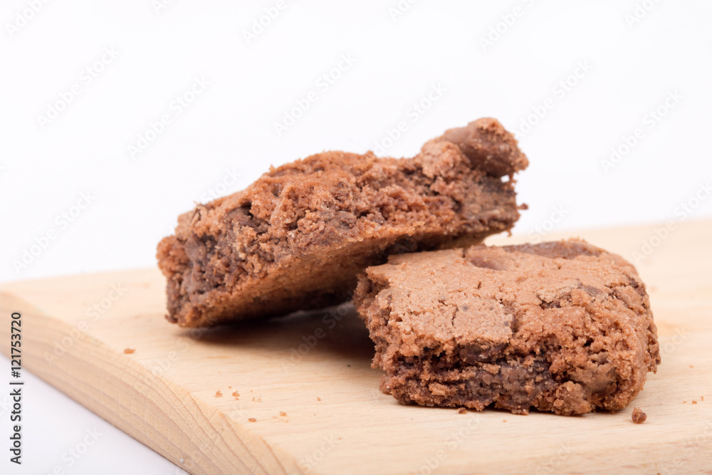 Chocolate brownies over white background.
