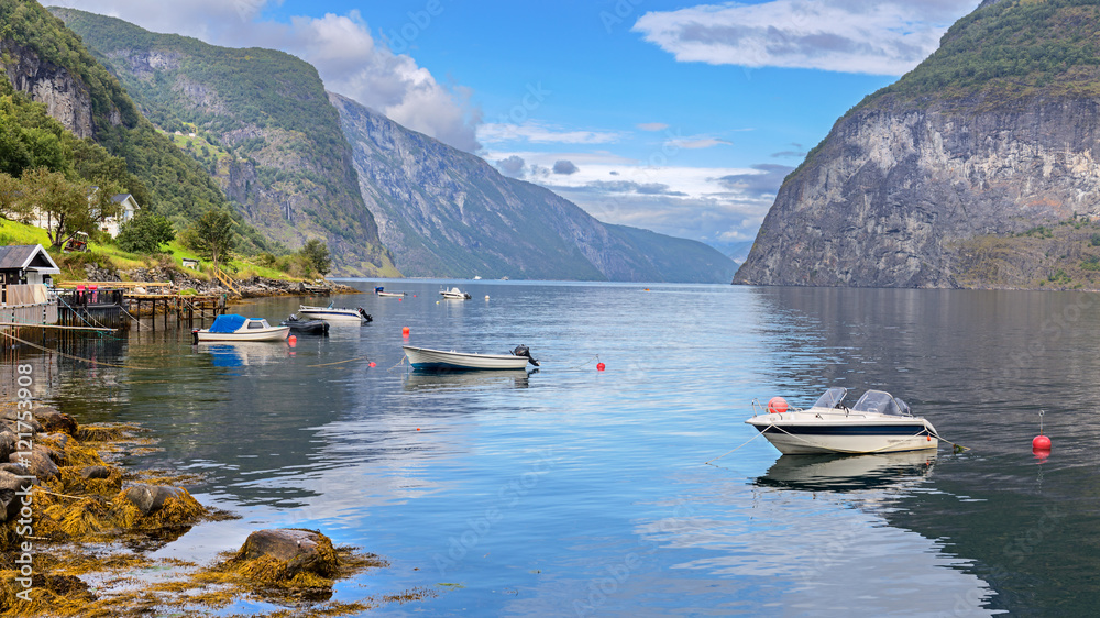 Boats in Undredal with the fjord in the background, Norway