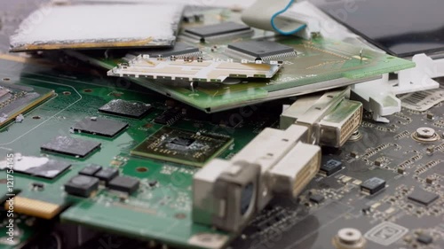 dolly tracking shot over scrap circuit boards