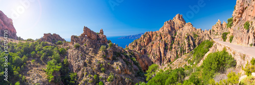 Calanques de Piana with the D81 coastline road on the west coast of Corsica, France
