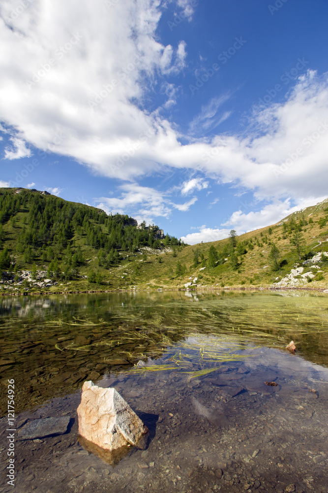 Fototapeta premium Beautiful alpine lake with clear water