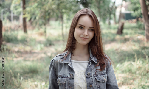 portrait of a beautiful girl closeup on street 