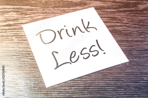 Drink Less Reminder On Paper On Wooden Cupboard