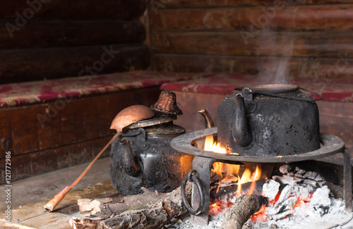 Black kettle over an open fire photo