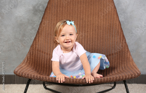 Little fashion-girl sitting...