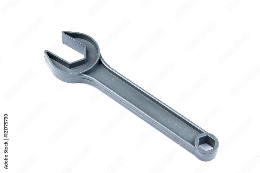Children's toy tool plastic color wrench isolated on white backg Children's toy tool plastic color wrench isolated on white backg
