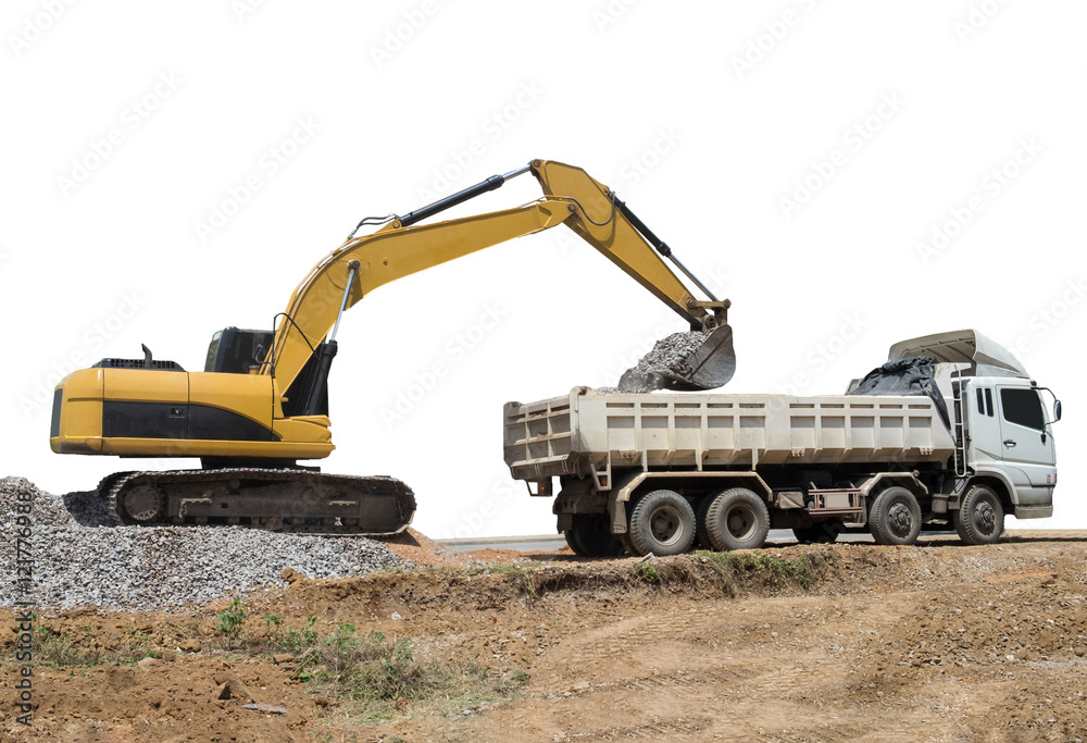 Backhoe heavy machine scoop rock onto the truck Backhoe heavy machine scoop rock onto the truck