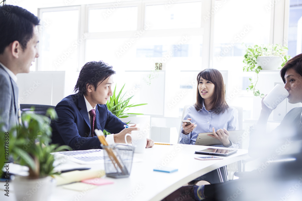 Young businessman is working in a stylish office Young businessman is working in a stylish office