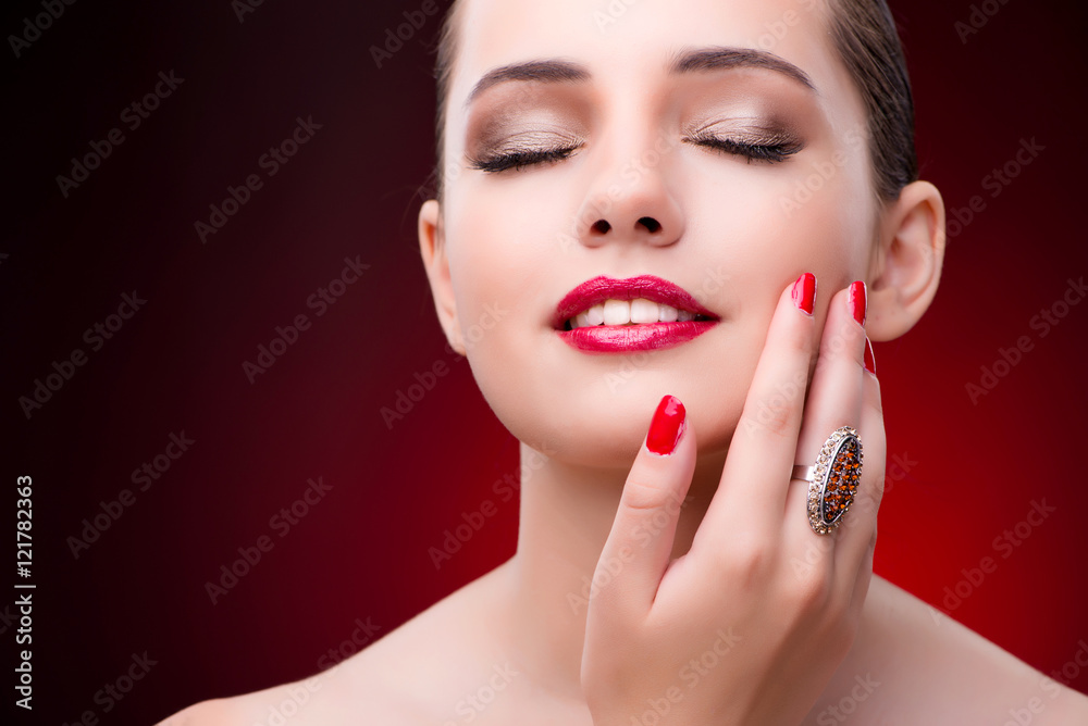 Woman in glamourous concept with jewelry Woman in glamourous concept with jewelry