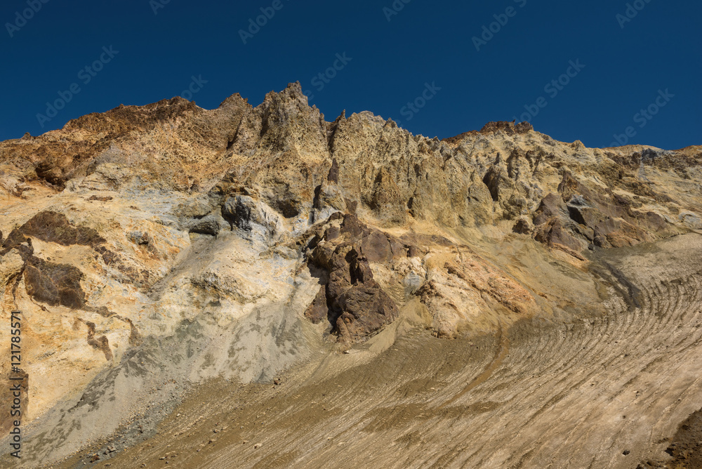 Rocky cliffs around the crater of Mutnovsky volcano, Kamchatka, Russia