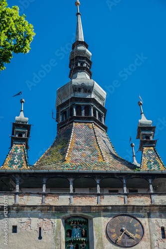 Clock Tower in Sighisoara town in Romania photo