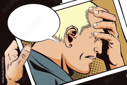 Hand with photo. Upset man clutching his head.