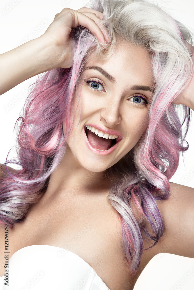 Young lady posing on white background. Beautiful hairstyle and hair color. Smiling face. Young lady posing on white background. Beautiful hairstyle and hair color. Smiling face.