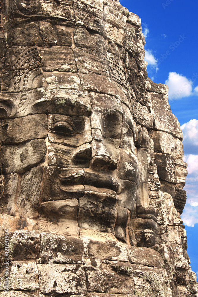 Giant stone face in Prasat Bayon Temple, Angkor Wat complex, Sie