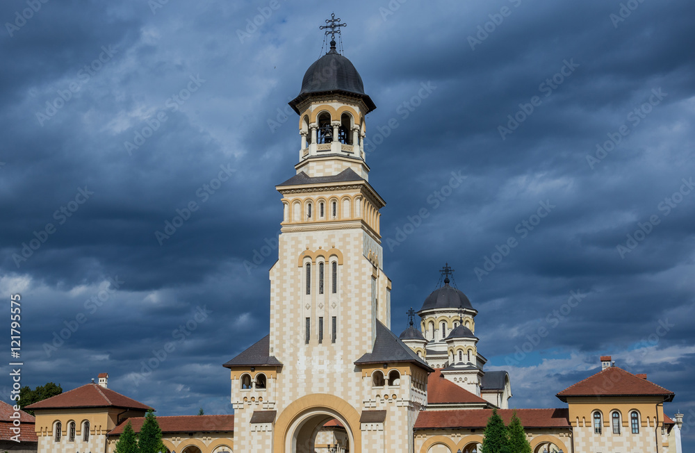 Bell tower of Coronation Cathedral deticated to Holy Trinity in Citadel of Alba Iulia city in Romania