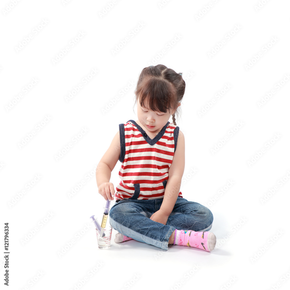 little asian girl take a medicine on white background little asian girl take a medicine on white background