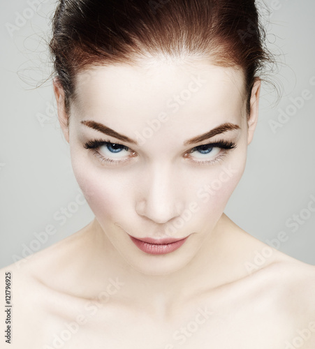 Beautiful woman face. Mascara Applying.Eyes Make-up. Beautiful S