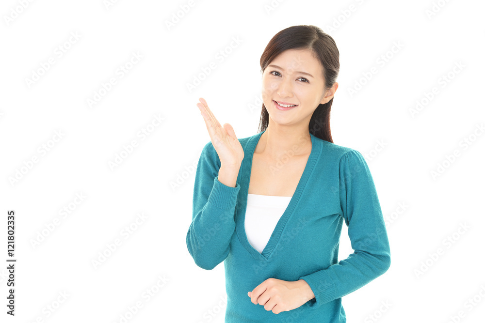 案内する笑顔の女性 案内する笑顔の女性