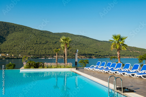 Nice swimming pool outdoors on bright summer day