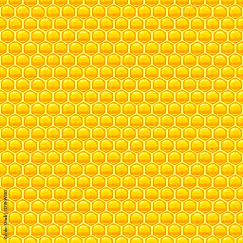 Seamless glossy yellow honeycomb pattern.