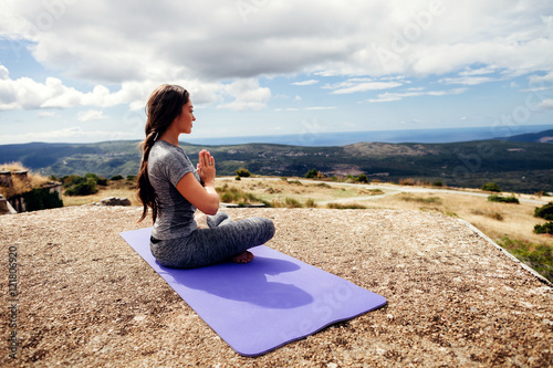 woman yoga practice in mountains