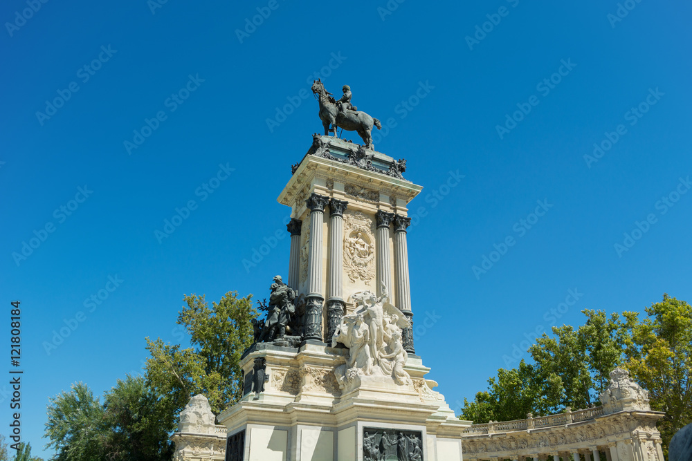Monument of Alfonso XII Detail, The Peace and The Progress sculpture groups, Pond of the Park of the Pleasant Retreat, Madrid, Spain Monument of Alfonso XII Detail, The Peace and The Progress sculpture groups, Pond of the Park of the Pleasant Retreat, Madrid, Spain