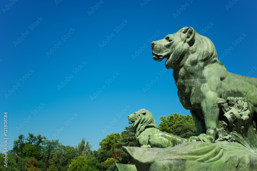 Bronze Lions, Monument of Alfonso XII, Pond of the Park of the Pleasant Retreat, Madrid, Spain