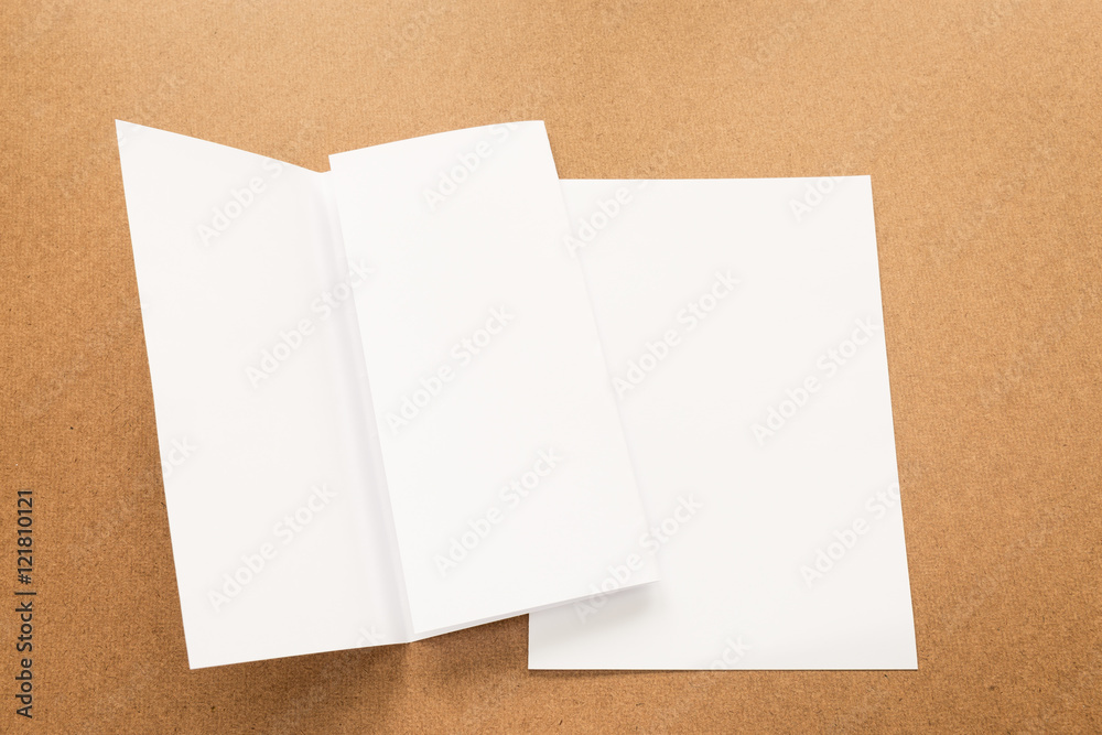 White paper note on business wood desk with copy space. White paper note on business wood desk with copy space.