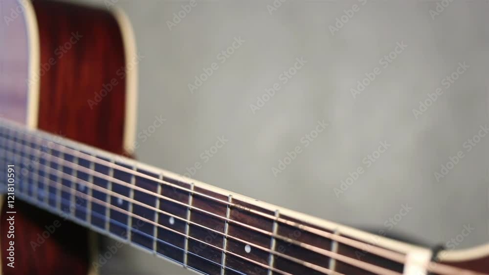 Close up view of acoustic guitar