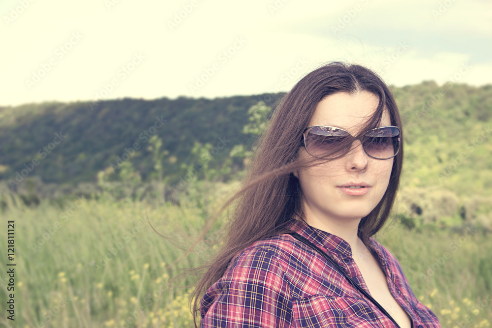 Portrait of an young beautiful woman on the nature. Portrait of an young beautiful woman on the nature.