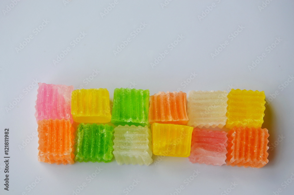 colorful crispy candy on white plate colorful crispy candy on white plate