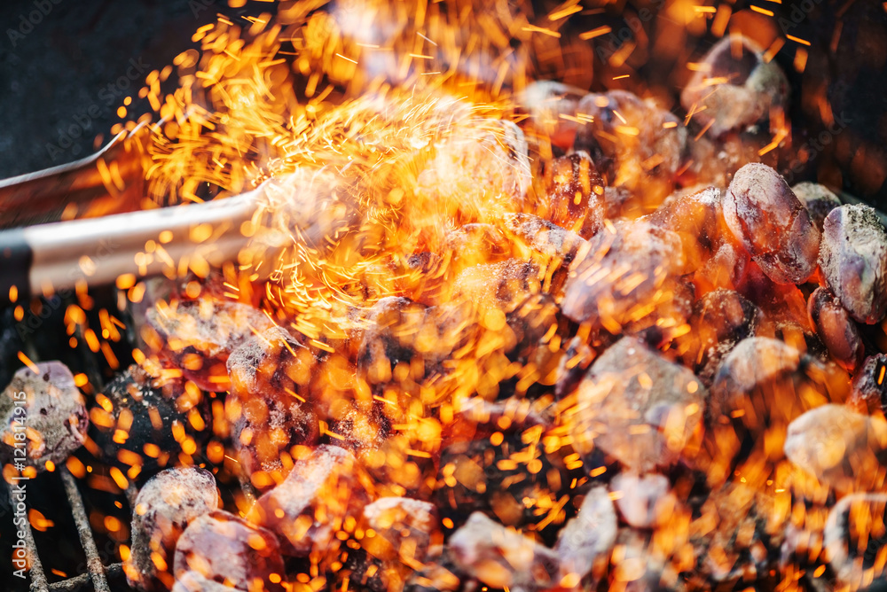Glowing charcoal and flame Glowing charcoal and flame