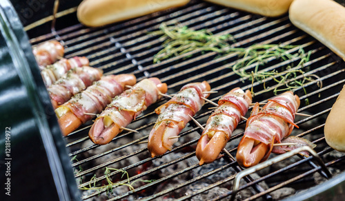 Grilled sausage with bacon