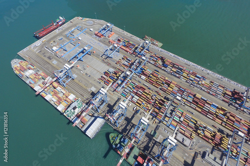 Commercial port with container ship - Aerial photo