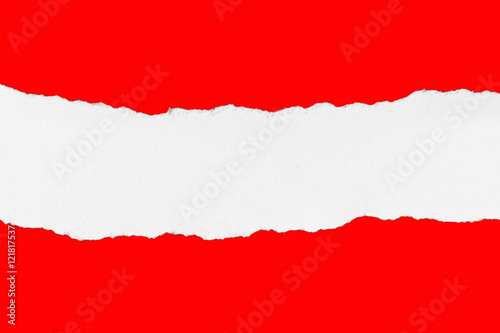 Torn Piece of White Paper on Red background