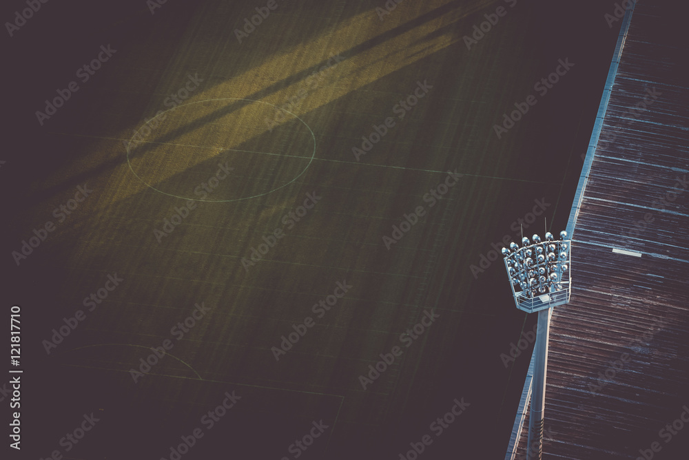 Fototapeta premium Boisko do piłki nożnej stadion piłkarski z reflektorami