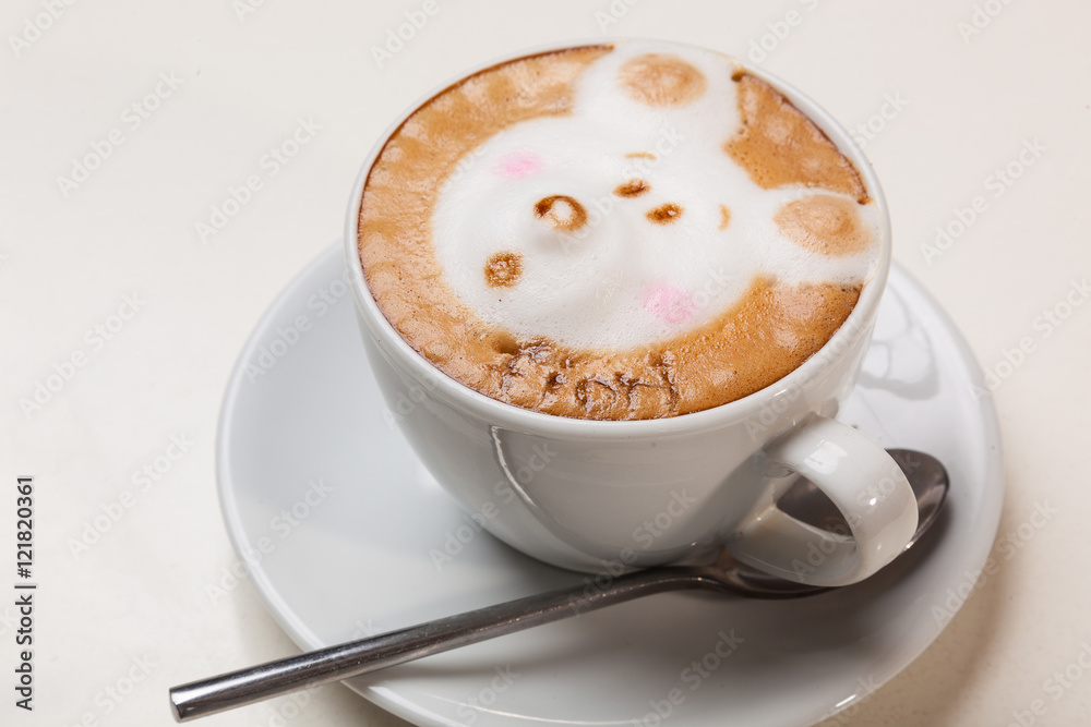Coffee with foam in the form of dog head Coffee with foam in the form of dog head