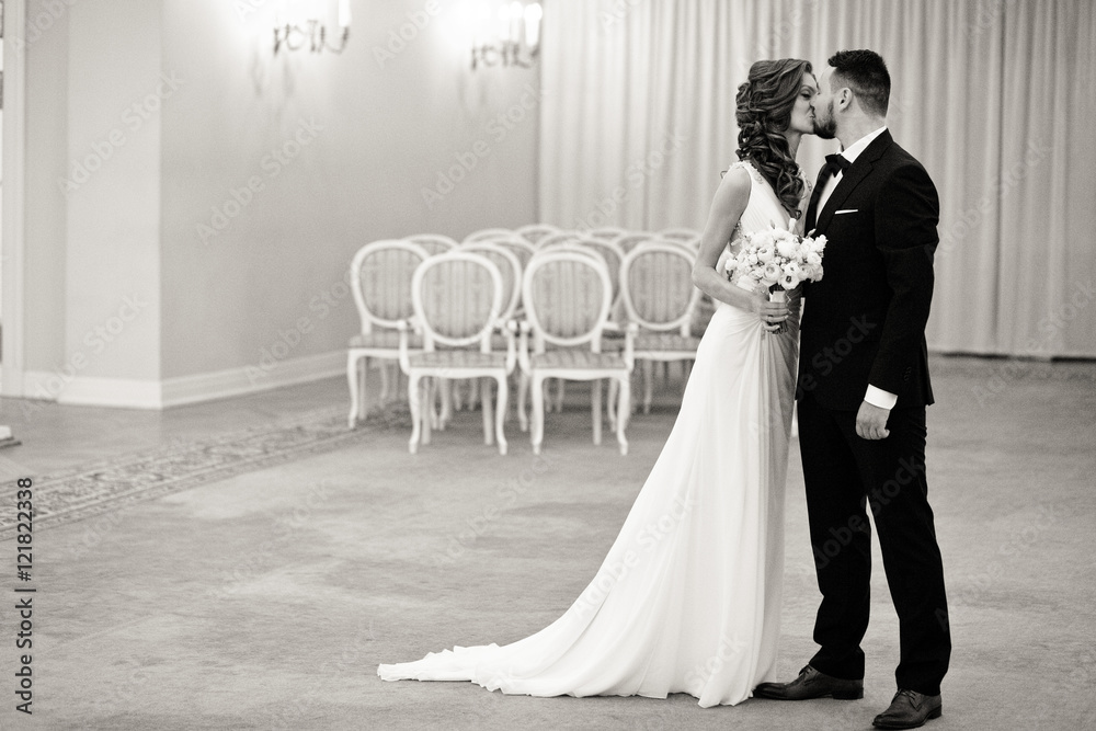 Black and white photo of the wedding kiss