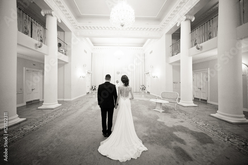 Wedding ceremony in the hall with the columns