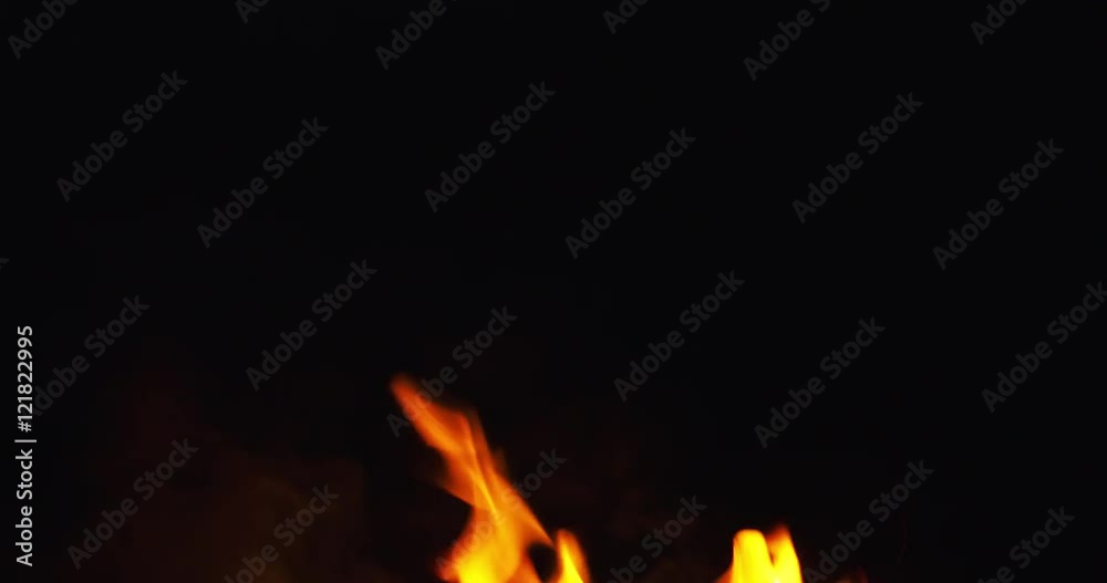 fire sparks from campfire over black background fire sparks from campfire over black background