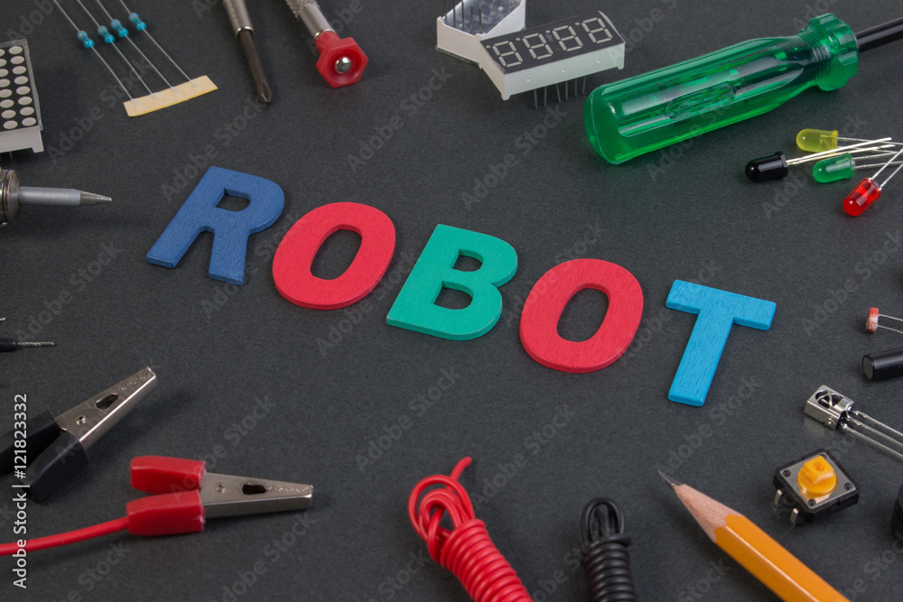 Close up view of robot kit consisting control boards, tools and variety of sensor. Close up view of robot kit consisting control boards, tools and variety of sensor.